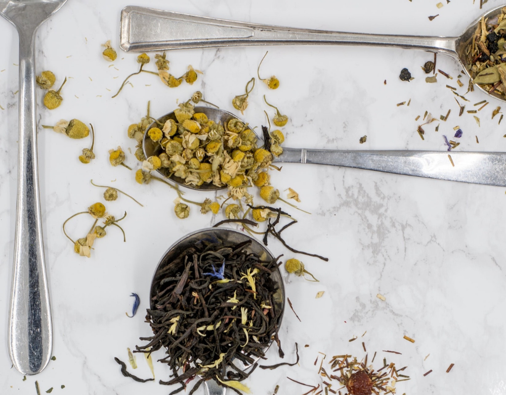 Chamomile tea leaves in spoon